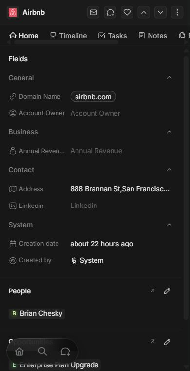 Actual CRM company record in a phone-sized browser, with fields and linked people